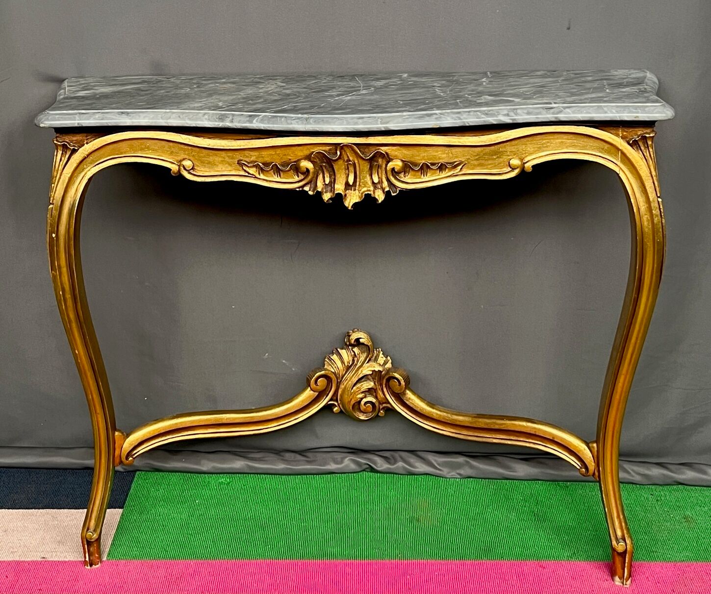 Baroque style console in carved wood with marble top