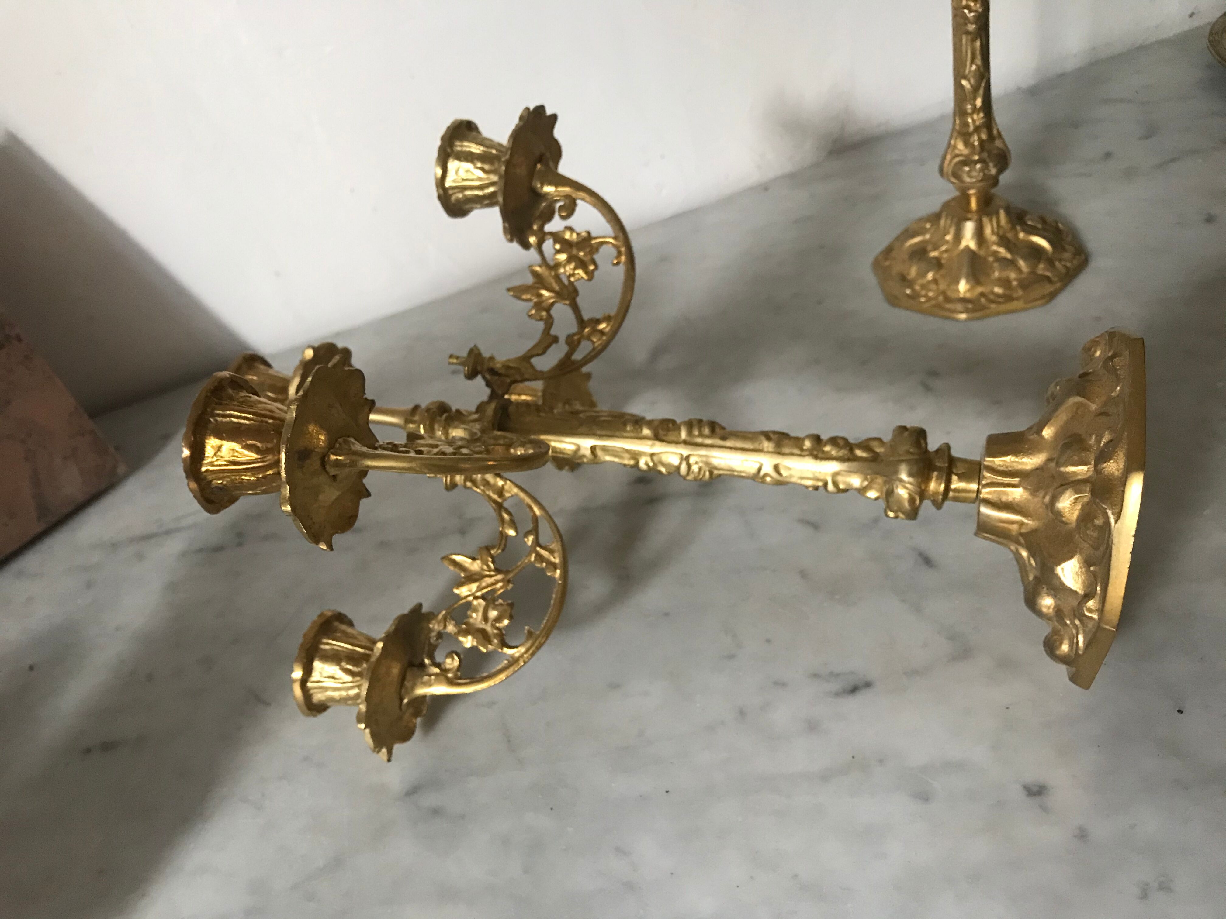 Pair of golden brass candlesticks