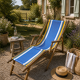 Vintage deck chair with blue and yellow striped fabric, original patina.