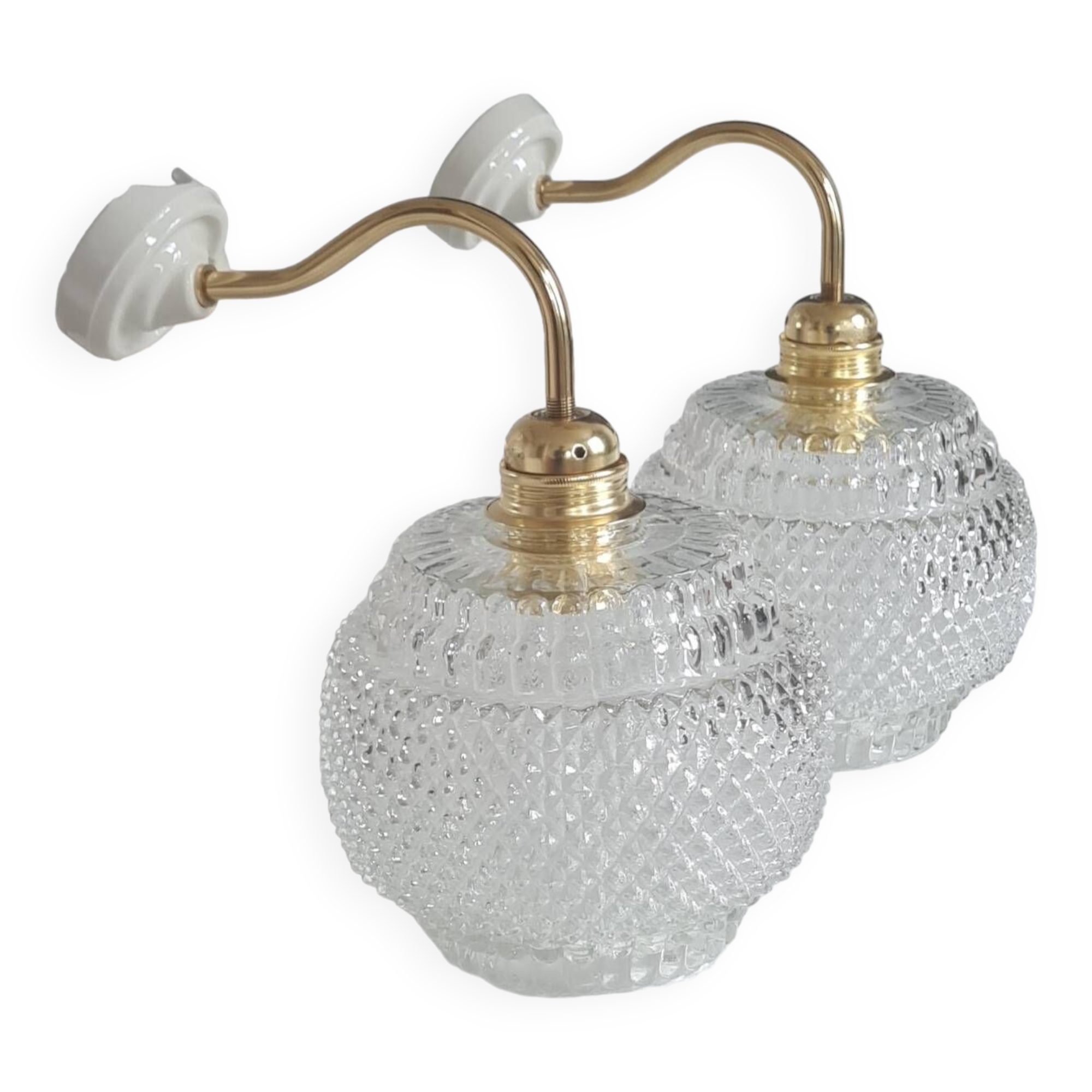 Pair of chiseled glass sconces