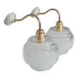 Pair of chiseled glass sconces