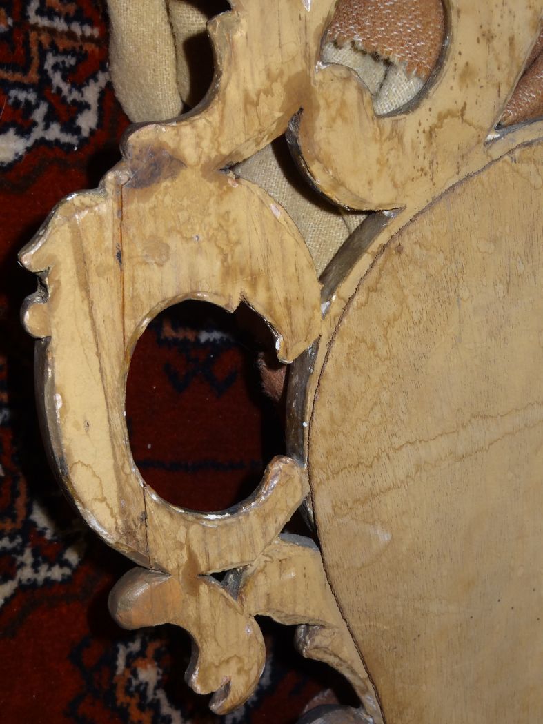 Carved and gilded wooden mirror with gold leaf 46 x 103 cm