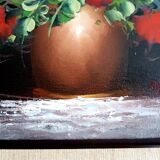 Oil on canvas bouquet of red flowers signed