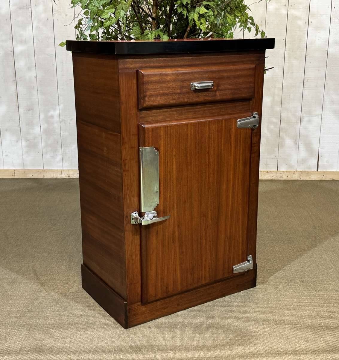 Bistro sideboard with 1 mahogany door and Formica top from the 1950s.