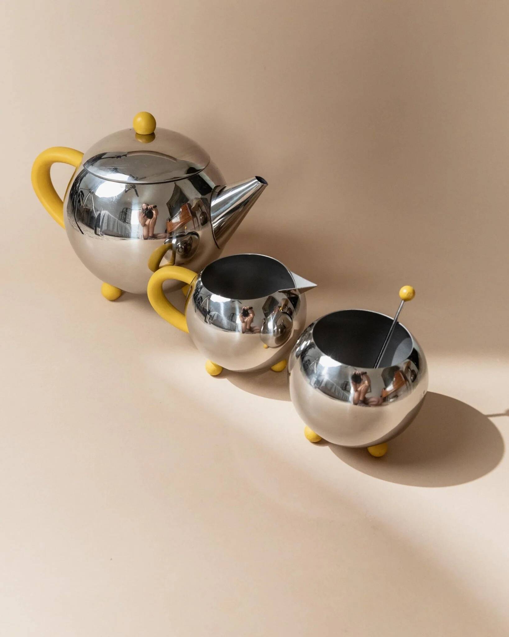 Space Age Vintage 1980s Stainless Steel Tea and Coffee Set with Yellow Accents Teapot Creamer and Sugar Bowl