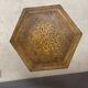 Carved wooden pedestal table