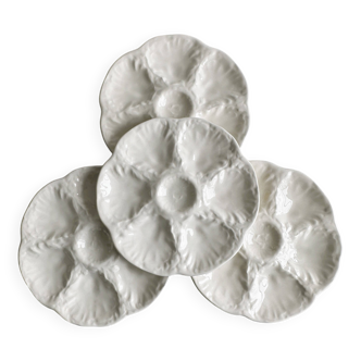 4 assiettes à coquillage en barbotine Gien blanche