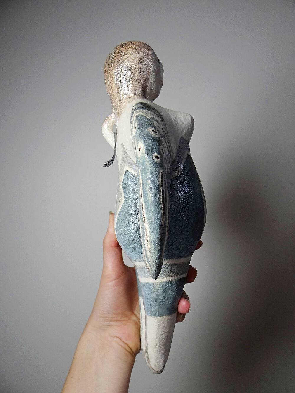 Vintage stylised mermaid ceramic wall sculpture from an art studio.