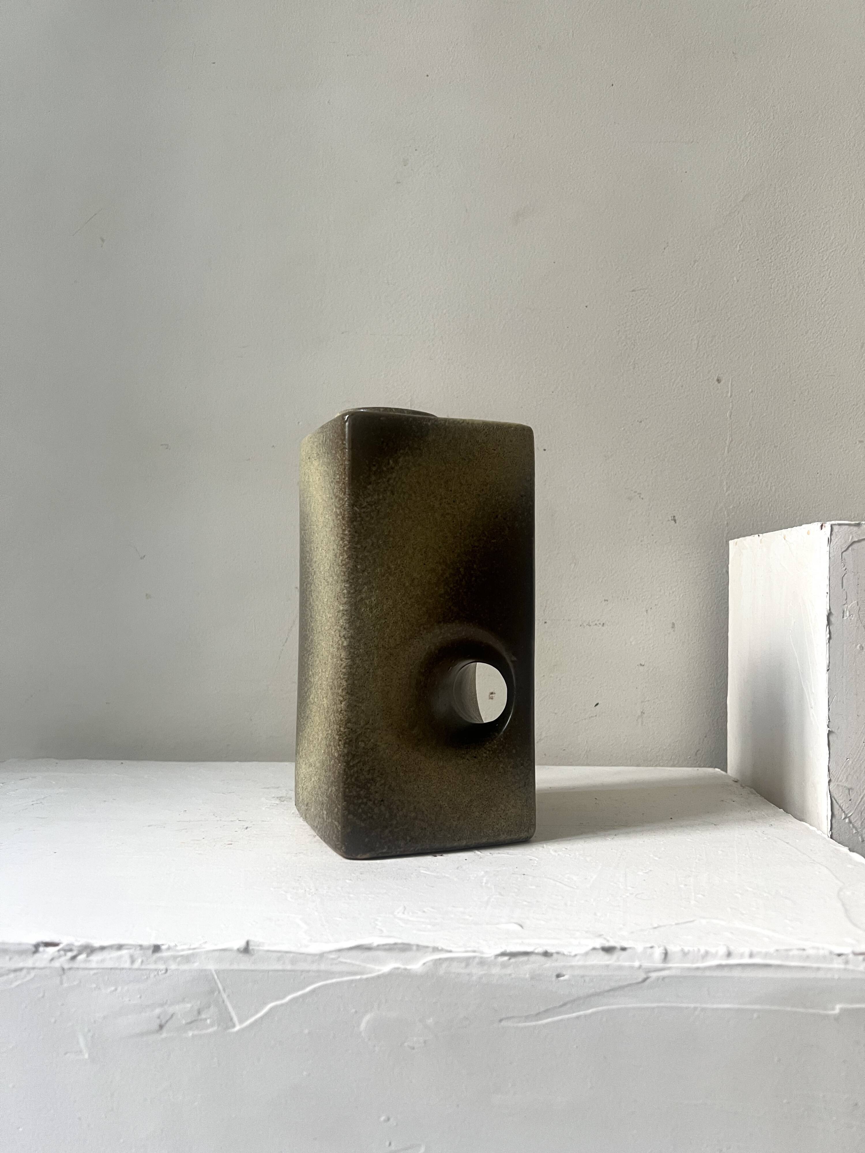 The modernist vase is German, VEB Haldensleben Fat Lava 1970.