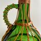 Bouteille en osier et verre