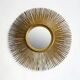 Large sunburst mirror with beveled glass and gilded wood from around 2010.
