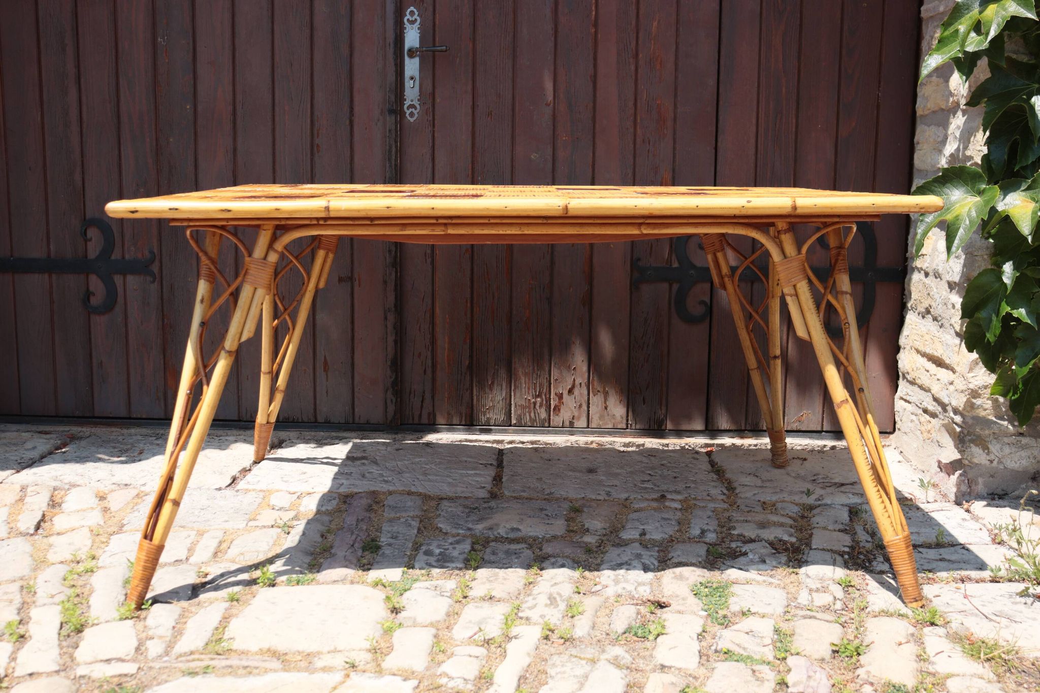Audoux Minet attribution  rattan and ceramic dining table