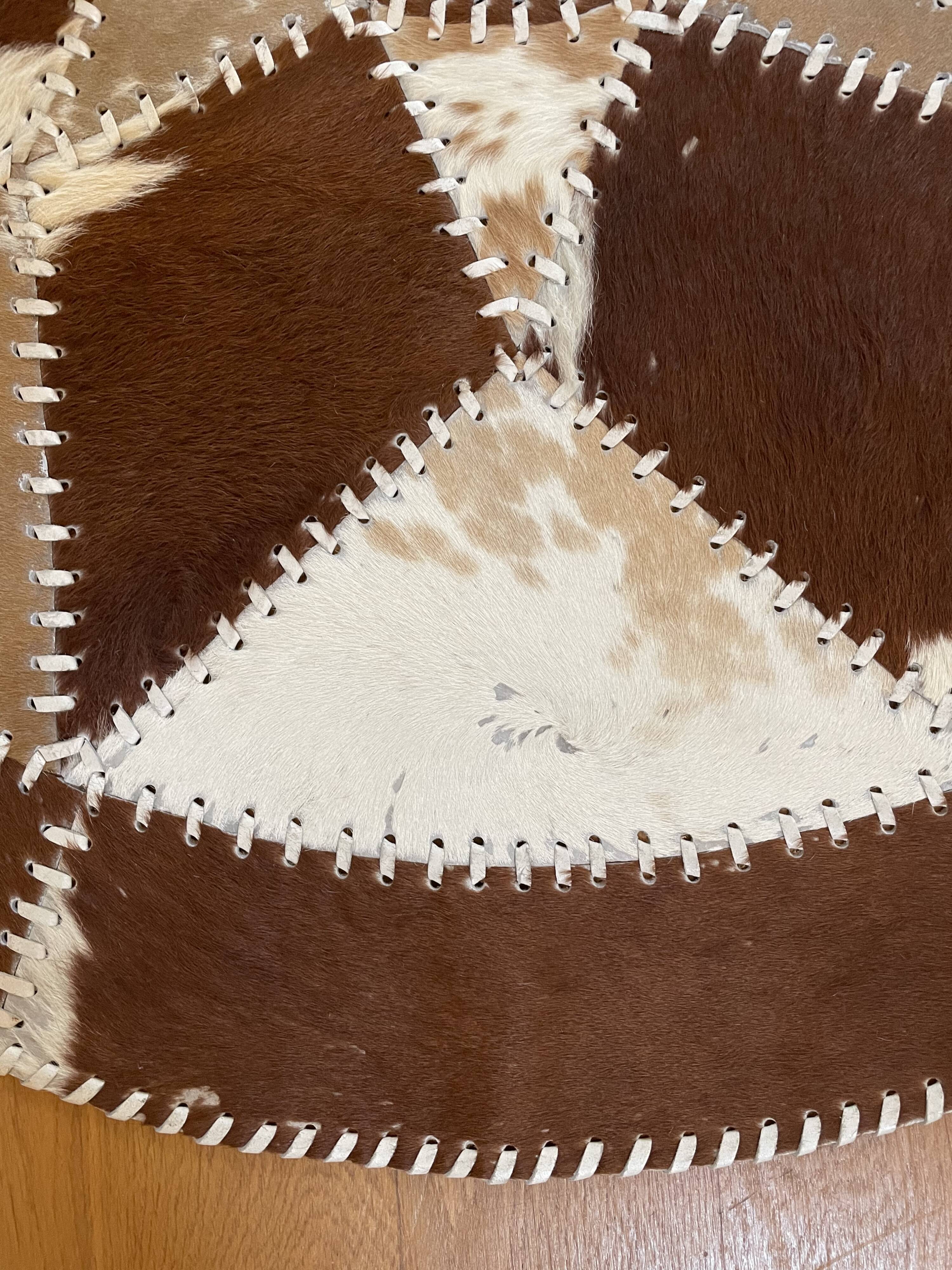 Vintage round cowhide rug 70
