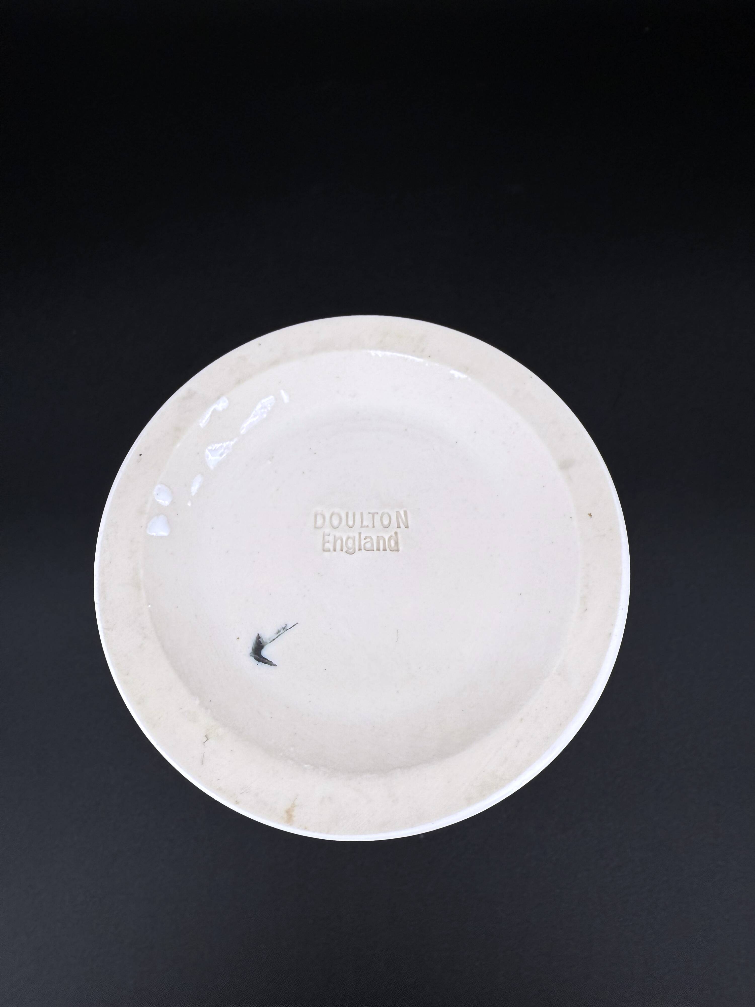 Pair of white earthenware candlesticks – Doulton, England, early 20th century