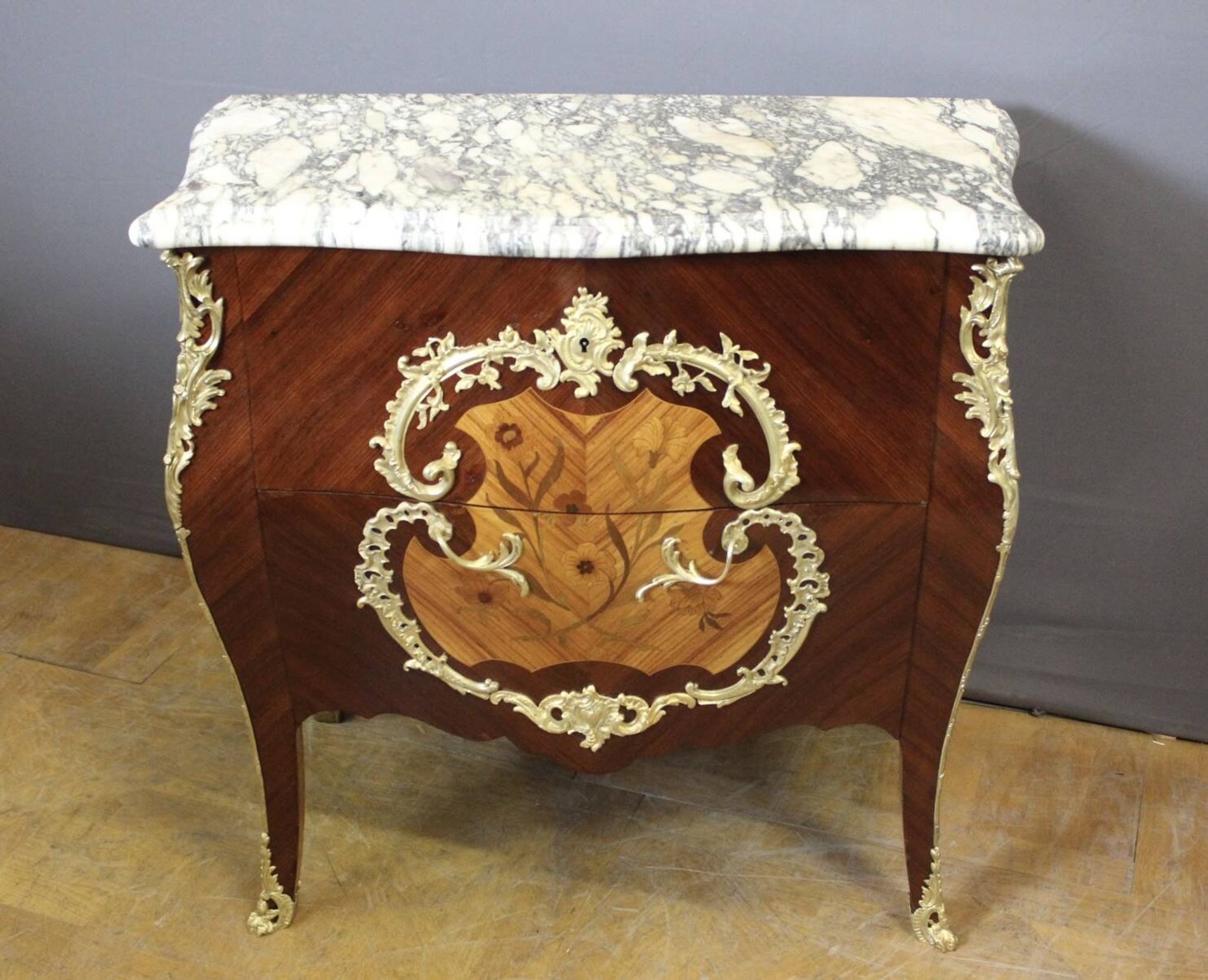 Louis XV style commode in marquetry around 1900