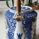 Japanese-inspired porcelain teapot.otifs Geishas kimonos, cherry blossoms
