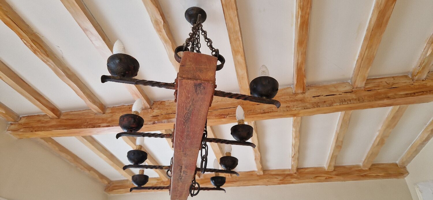 Wood and forged metal chandelier