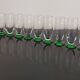 10 flûtes à champagne en verre à pied vert, années 30