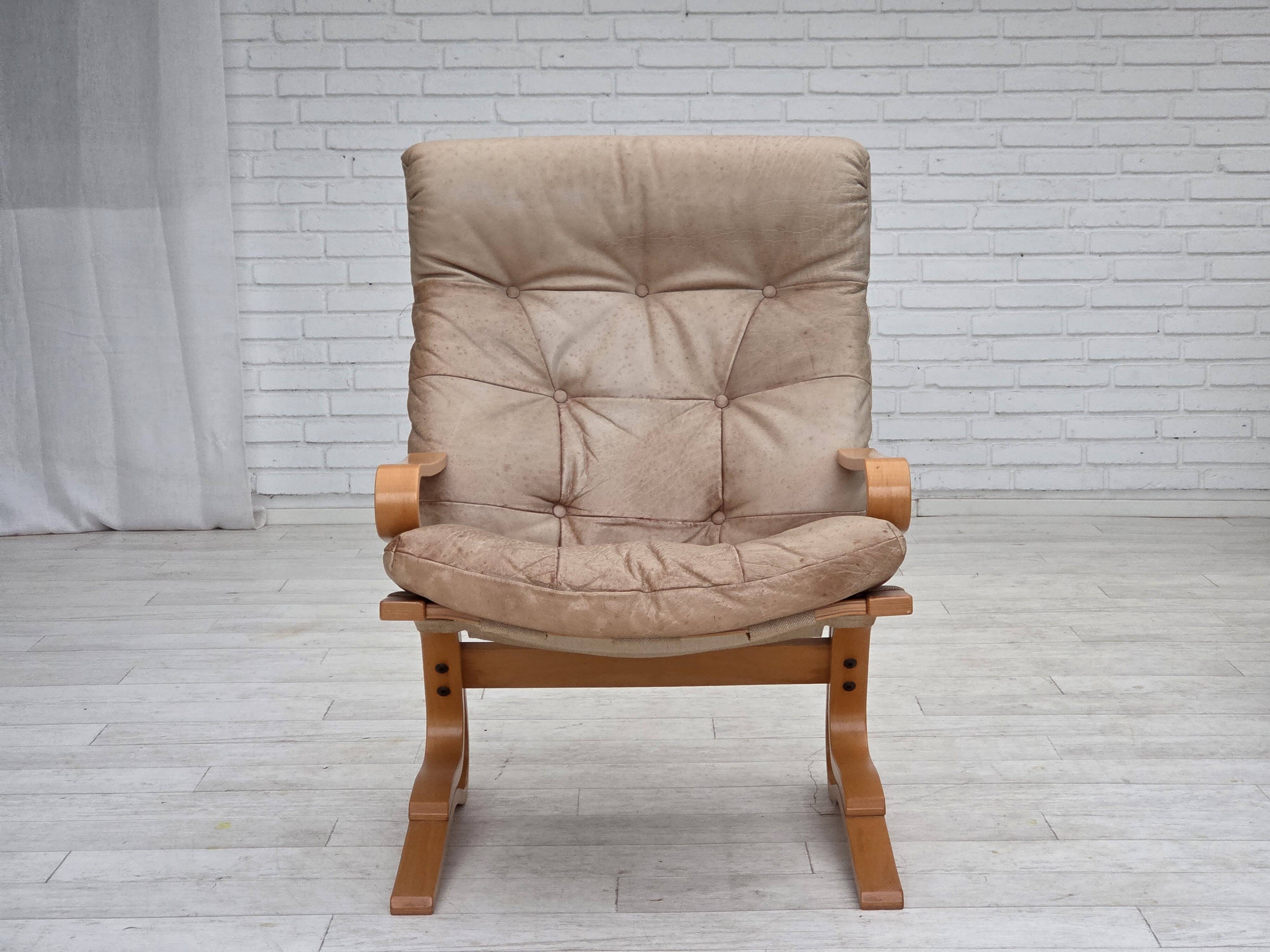 1970s, Norwegian armchair, model "Kengu", beige furniture leather.
