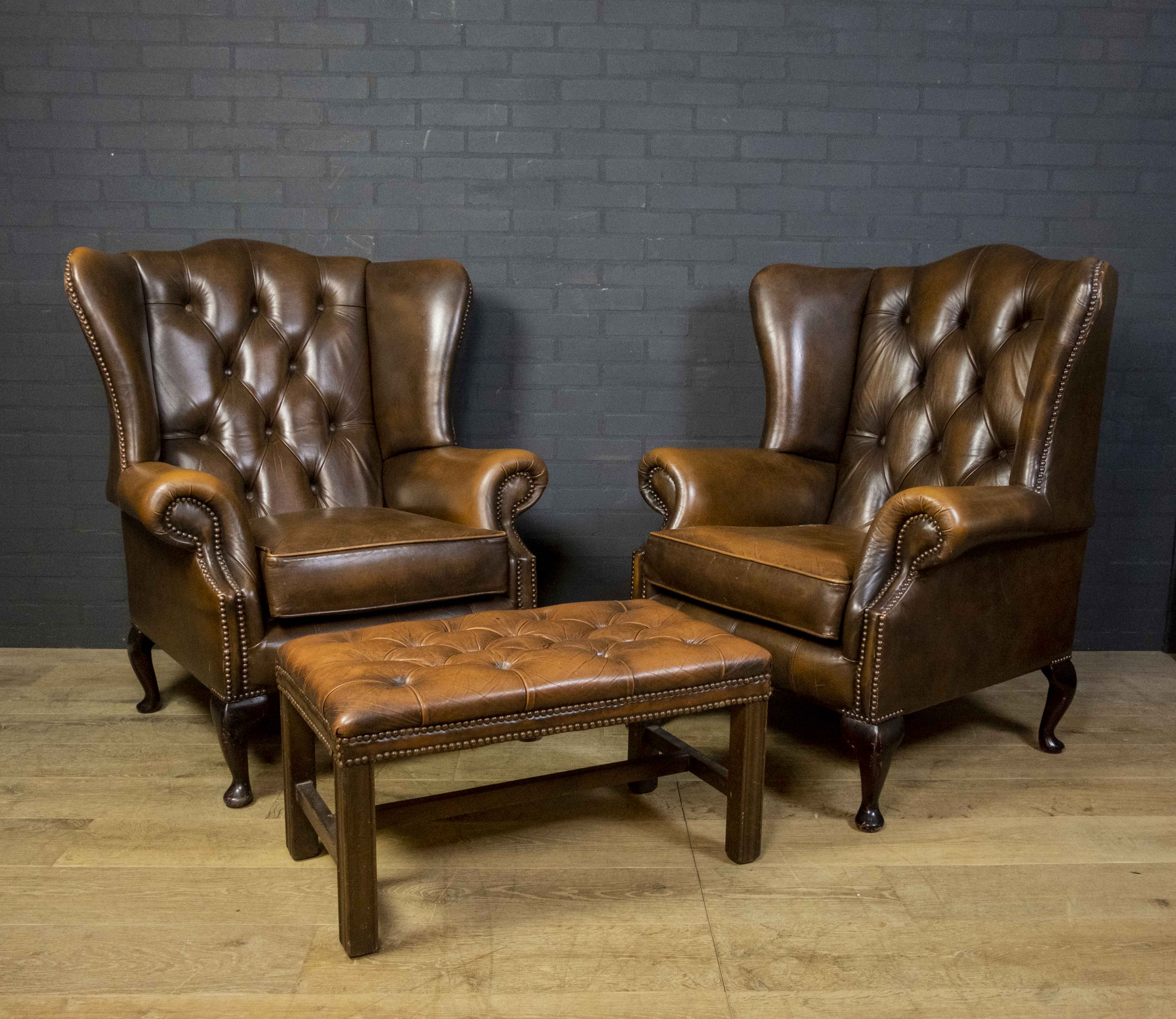 Set of Chesterfield armchairs with footstool