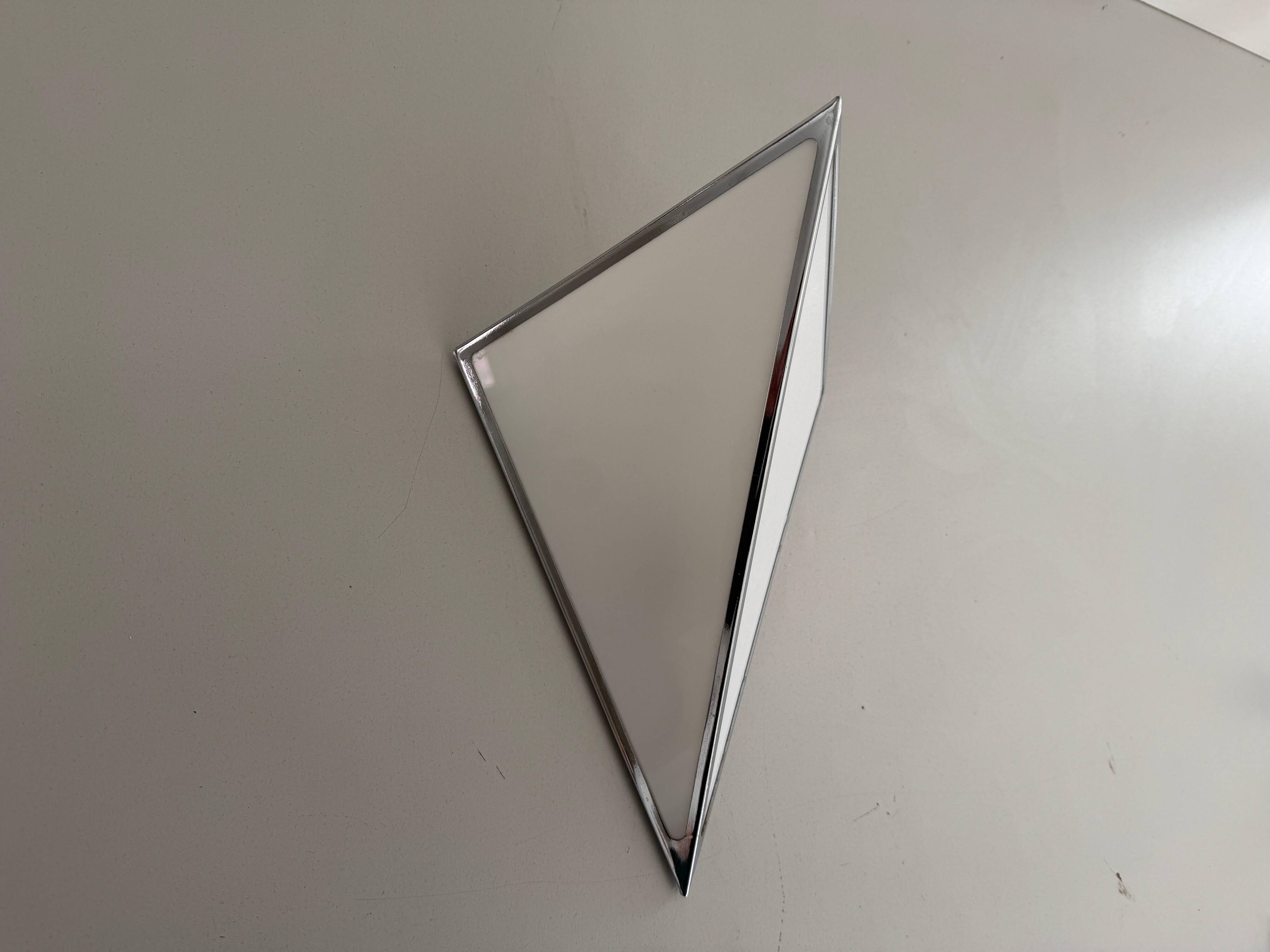 Simple opal glass wall light with an aluminium body, 1980s, Germany.