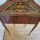 Louis XV bedside table or gueridon with floral motifs, 19th century.