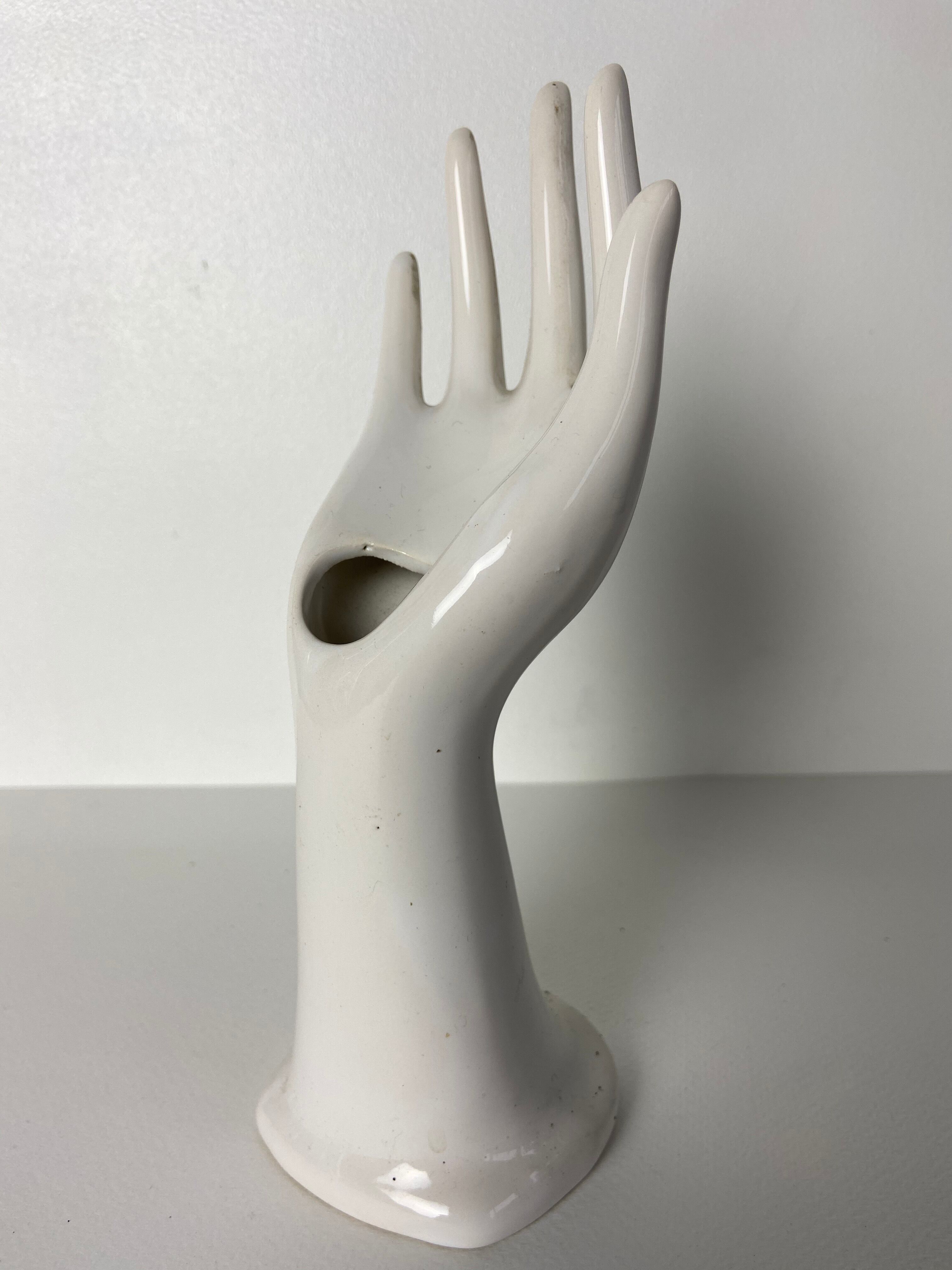 Hand vase in white earthenware