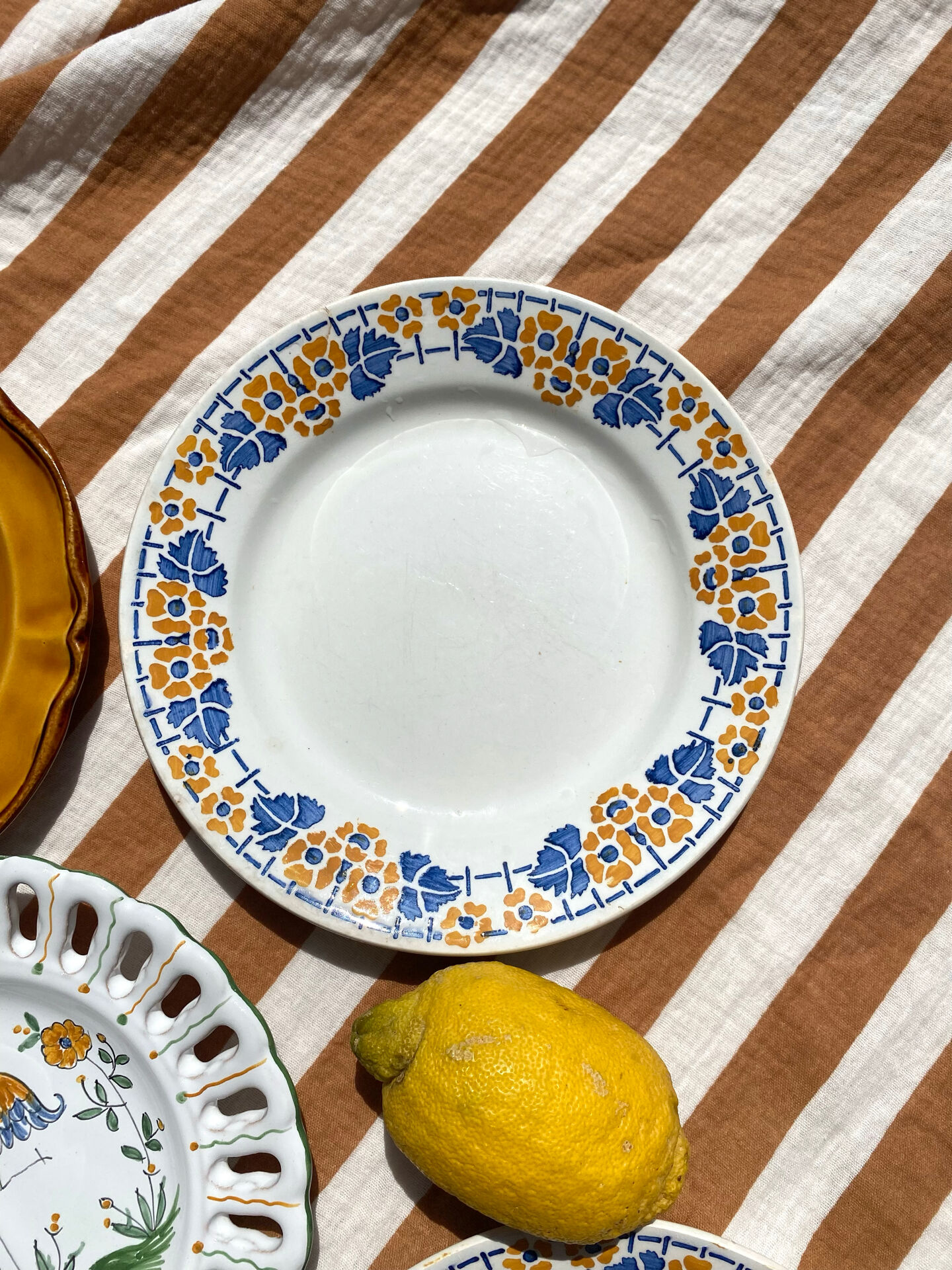 Set of twelve mismatched vintage dessert plates.
