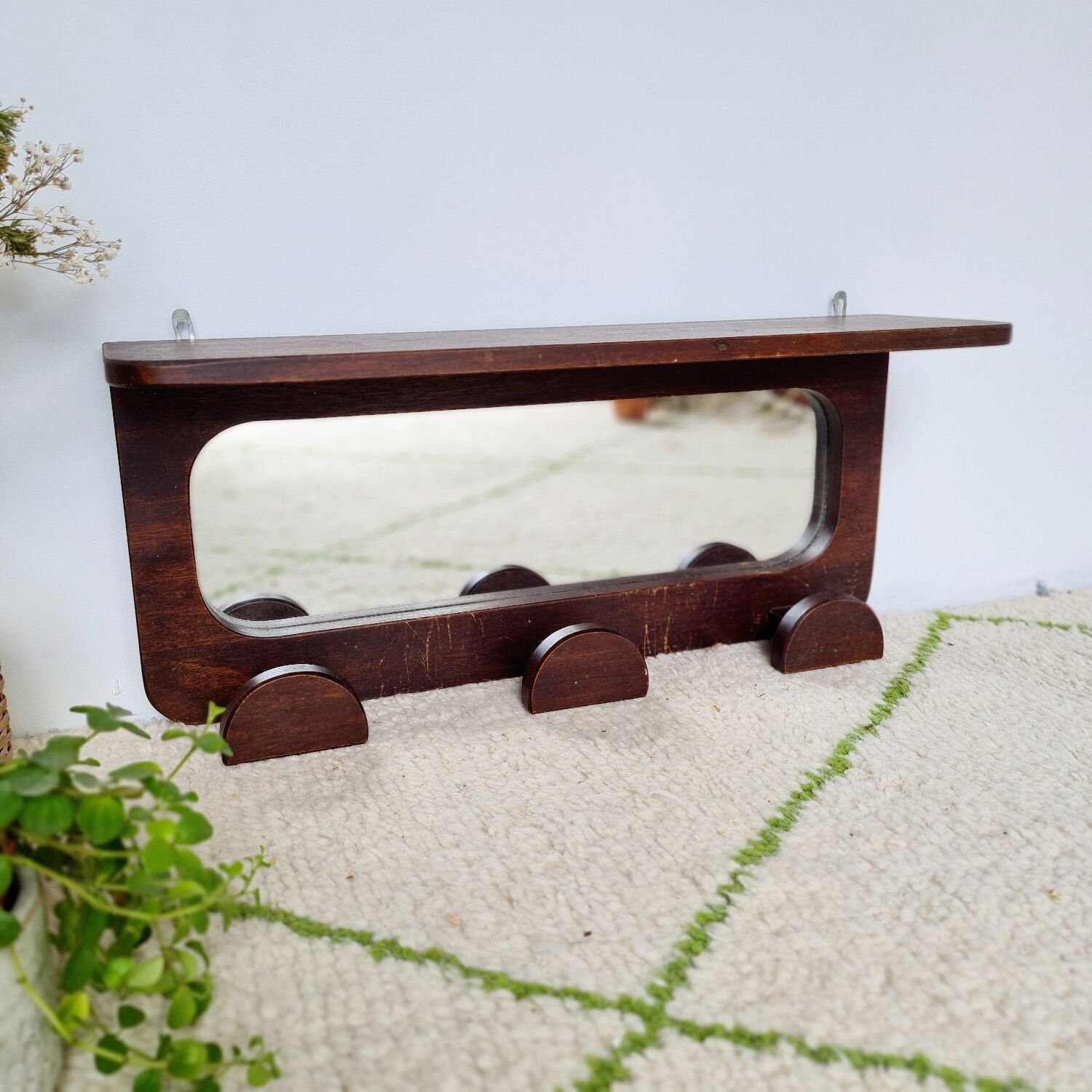 Antique coat rack in mirror wood