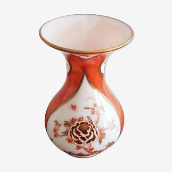 Orange vase patterned flowers