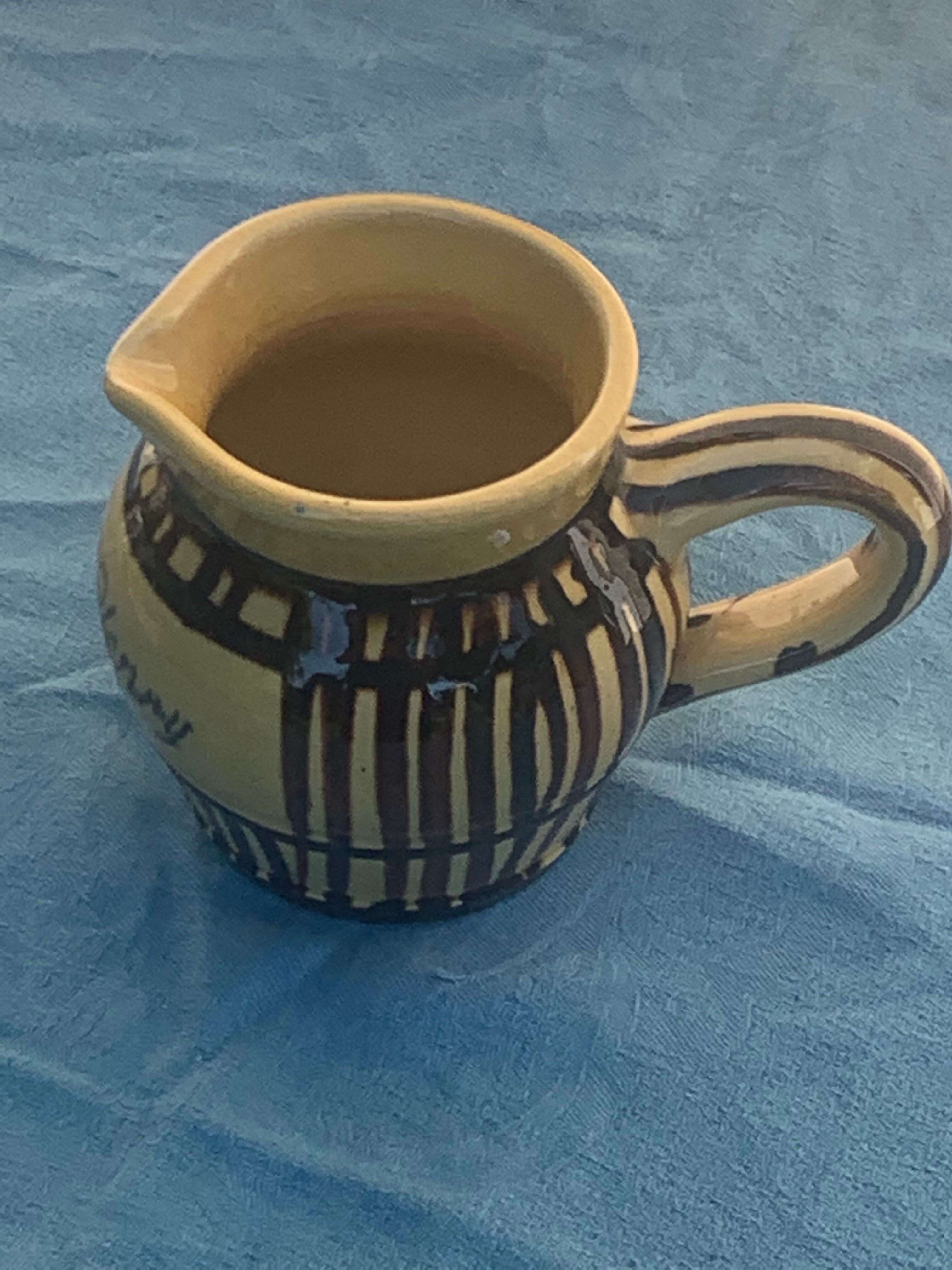 Vintage prince henry enamelled ceramic pitcher