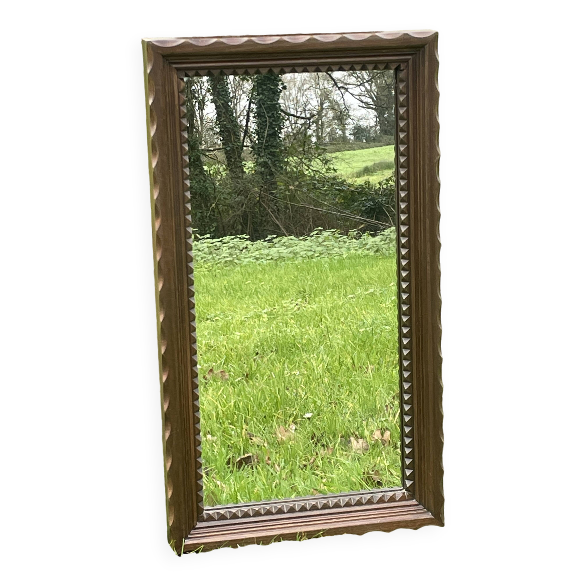 Rustic mirror called brutalist, molded carved natural wood