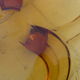 Empty cup tripod pocket in yellow smoked pressed glass