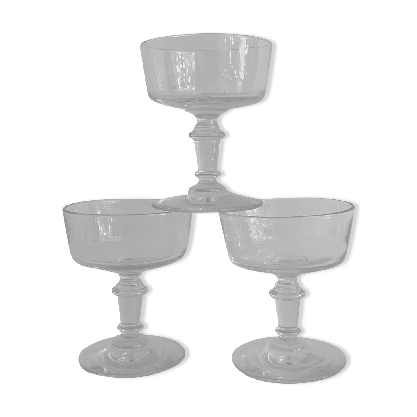 3 old champagne cups in blown and bubbled glass