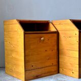Pair of handcrafted solid wood bedside tables with drop-down doors.