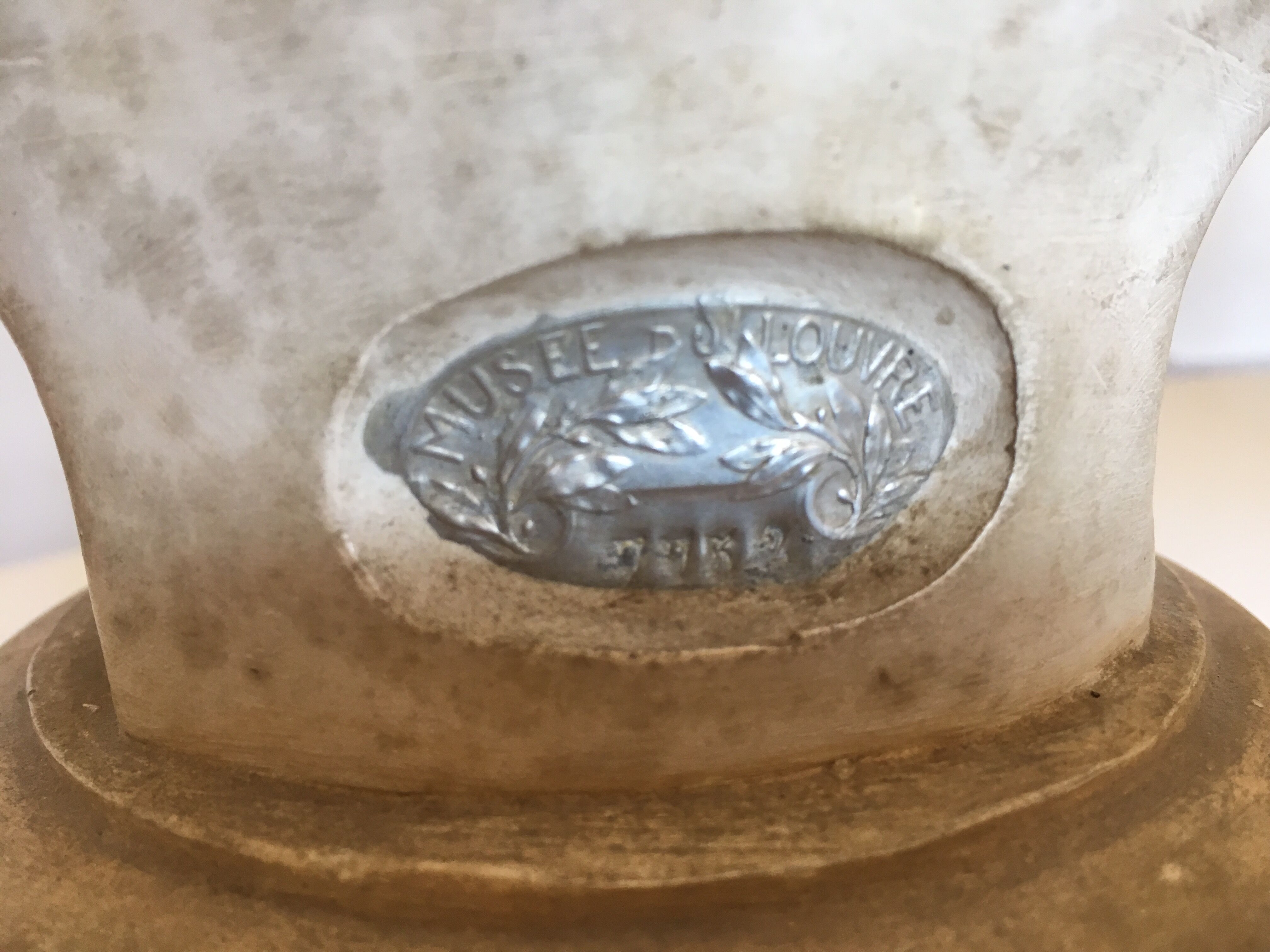 Former girl bust end 19th in plaster cast on its base