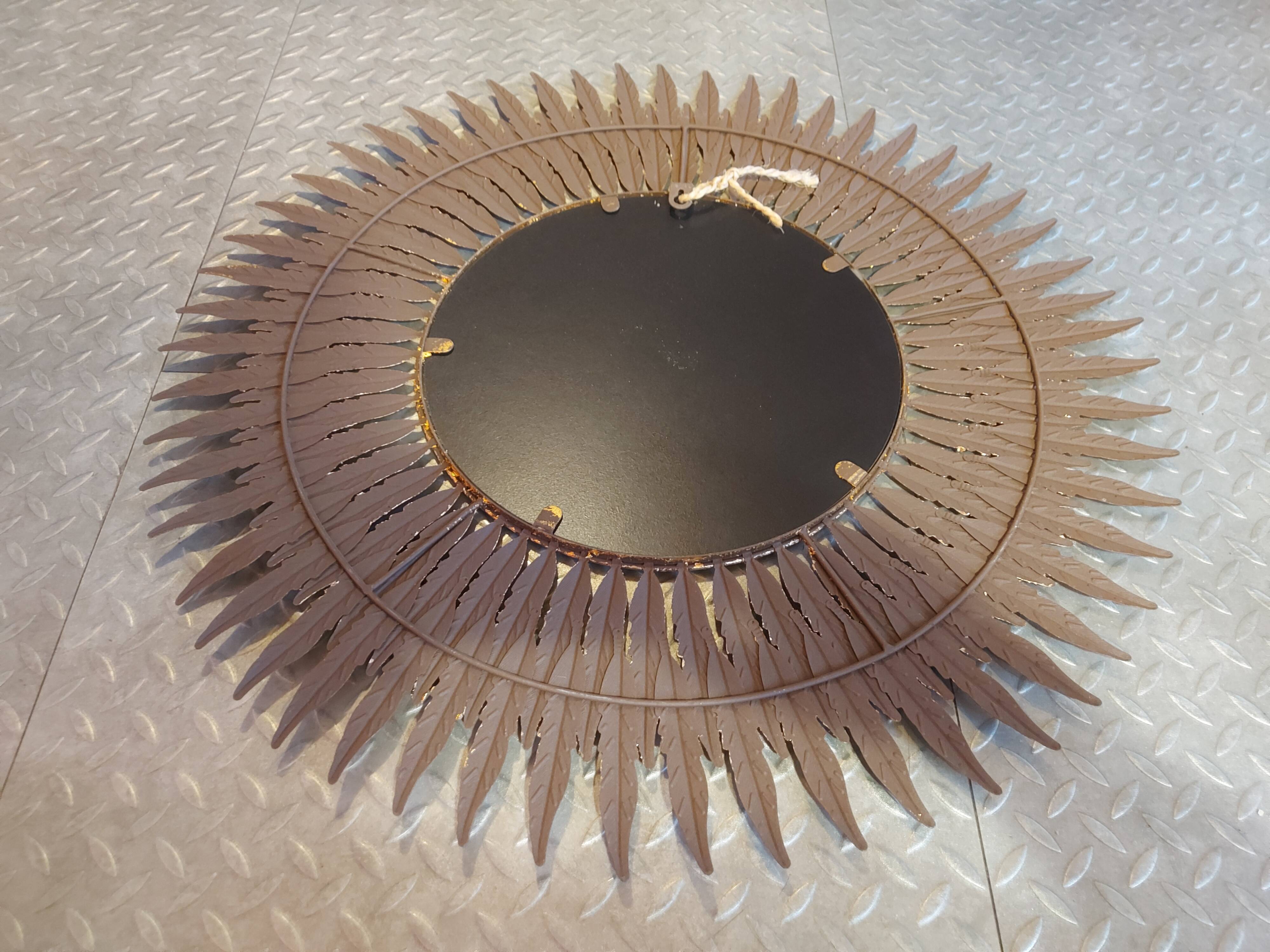 Miroir soleil en métal doré 62cm