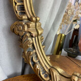 Miroir en bois et plâtre doré