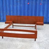 Teak bed with hanging bedside tables from the 60s