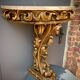 Carved wooden and marble console