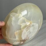 Marbled onyx pocket emptier