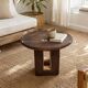 African monoxyle side table in carved wood with a curved top, 48x36 cm.