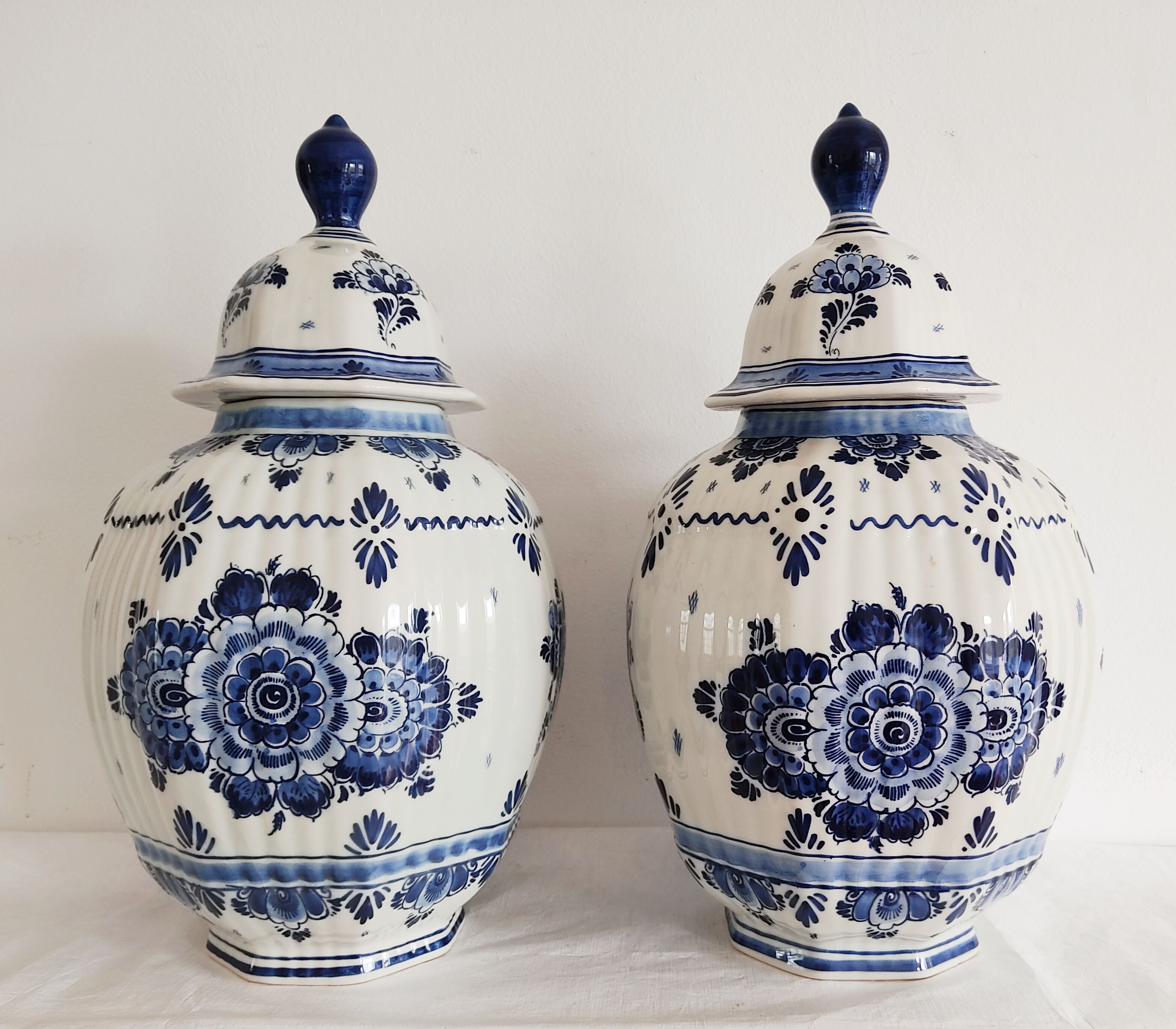 Pair of flowery Delft vases