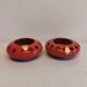 Pair of candle holders from the 1960s-1970s, crafted in red ceramic