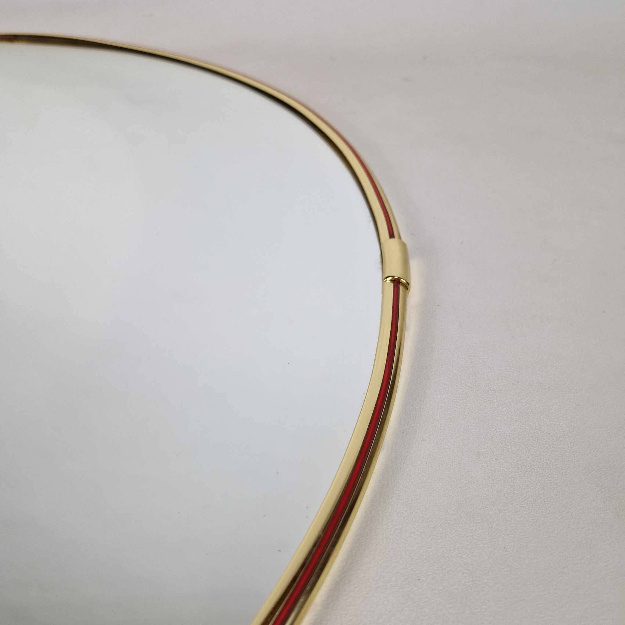 Grand miroir mural rond des années 60.