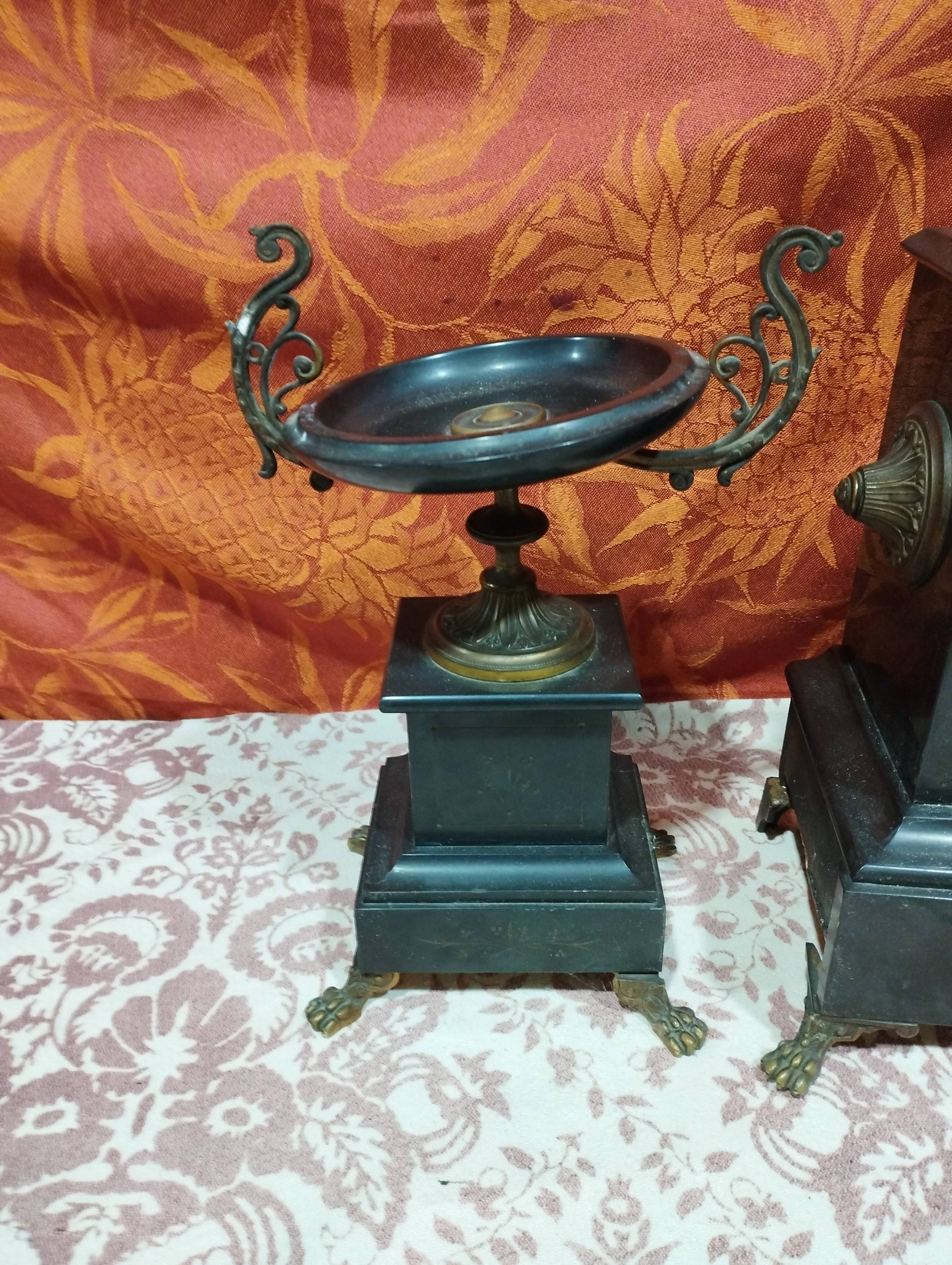 old Napoleon III marble fireplace surround with cups and pendulum