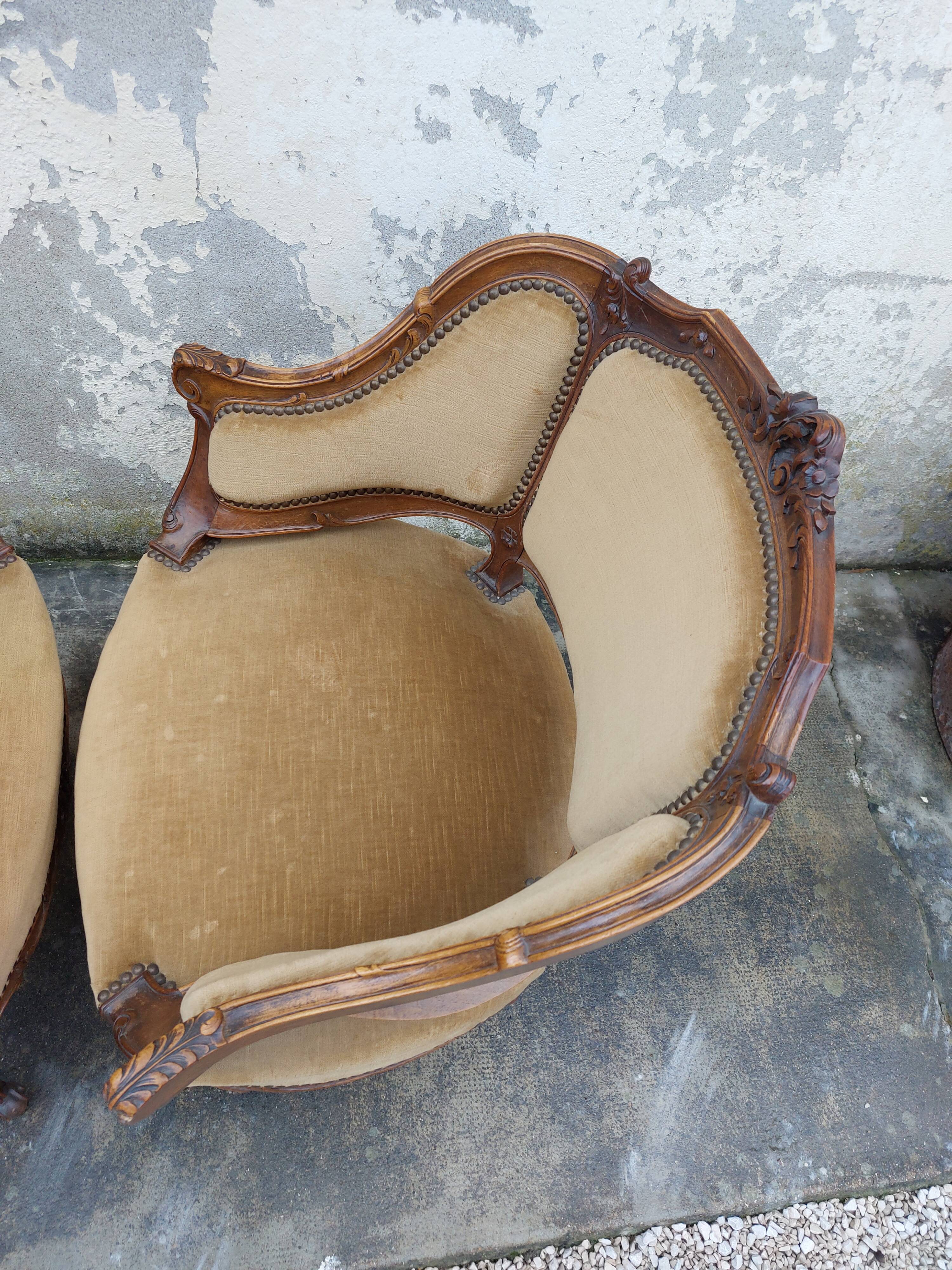 Paire de fauteuils corbeille louis XV en Noyer sculpté