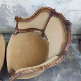 Pair of armchairs basket louis XV in carved walnut