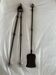 Large fireplace tongs and shovel from the 19th century.