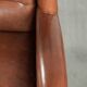 Large sheepskin wingback armchair in timeless English style
